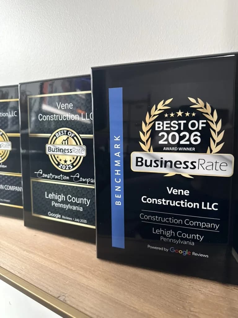 BusinessRate Best of 2026 construction company award plaque for Vene Construction in Lehigh County, displayed with the 2024 and 2025 awards