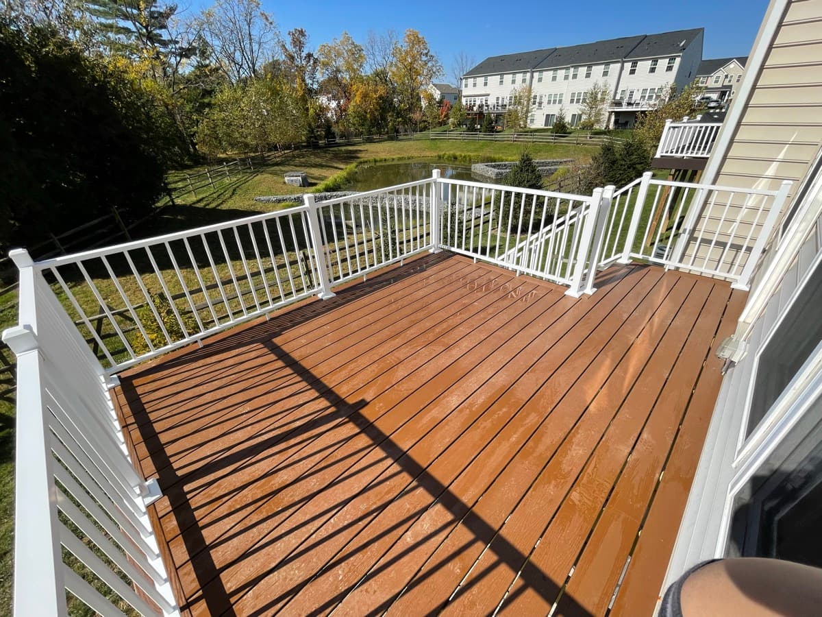 Raised Rear Deck With White Railing