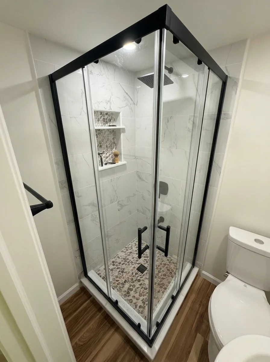 Finished basement bathroom with a tiled corner glass shower in Easton, PA