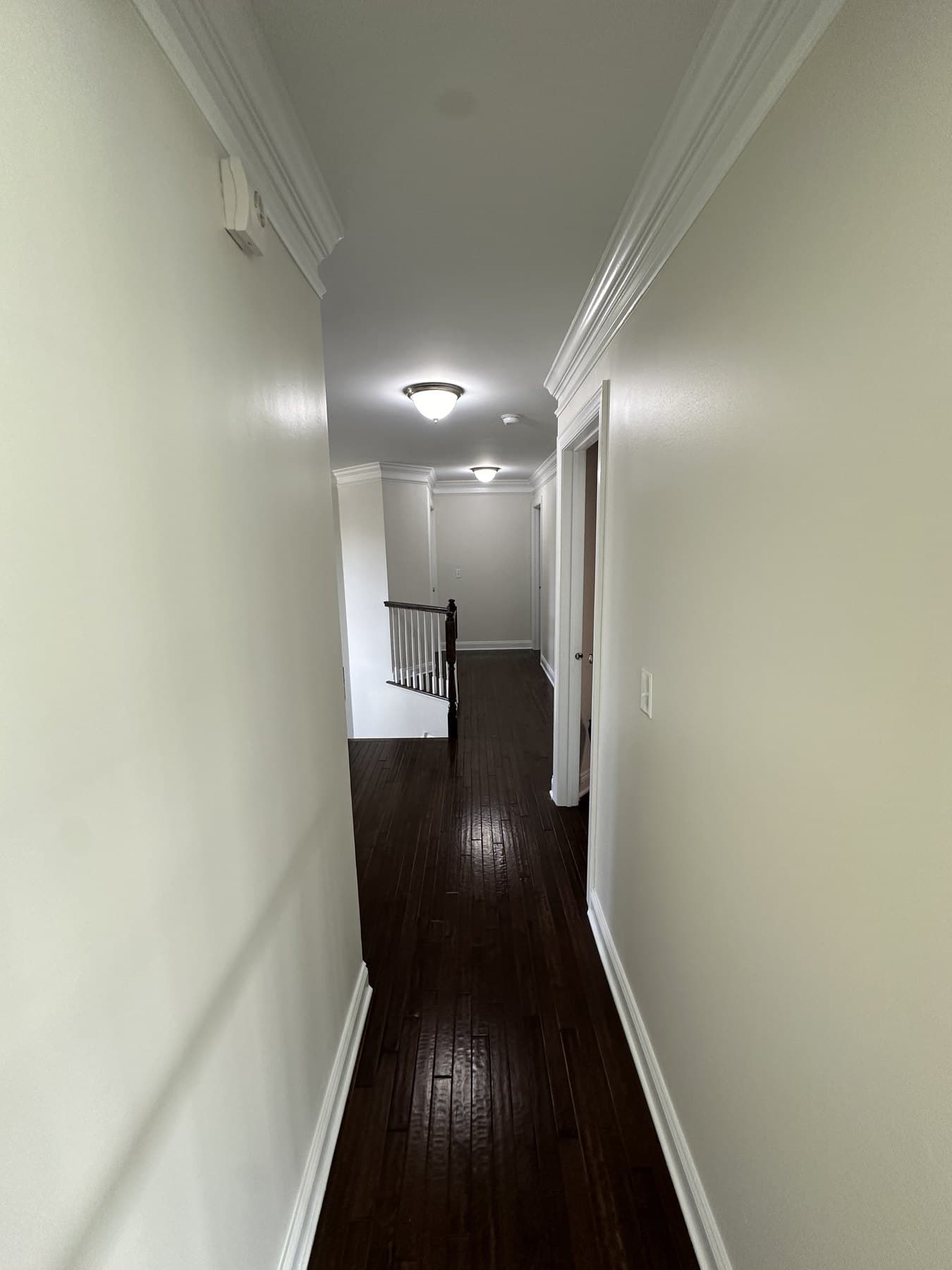 Finished hallway with white trim and light wall paint in Macungie PA