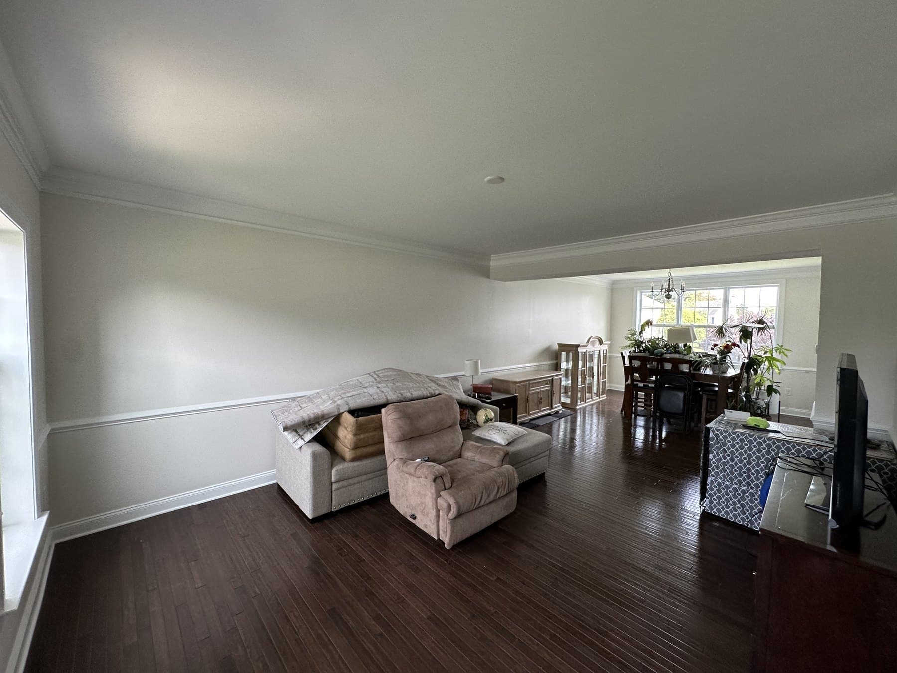 Living and dining room after interior painting and trim refresh in Macungie PA