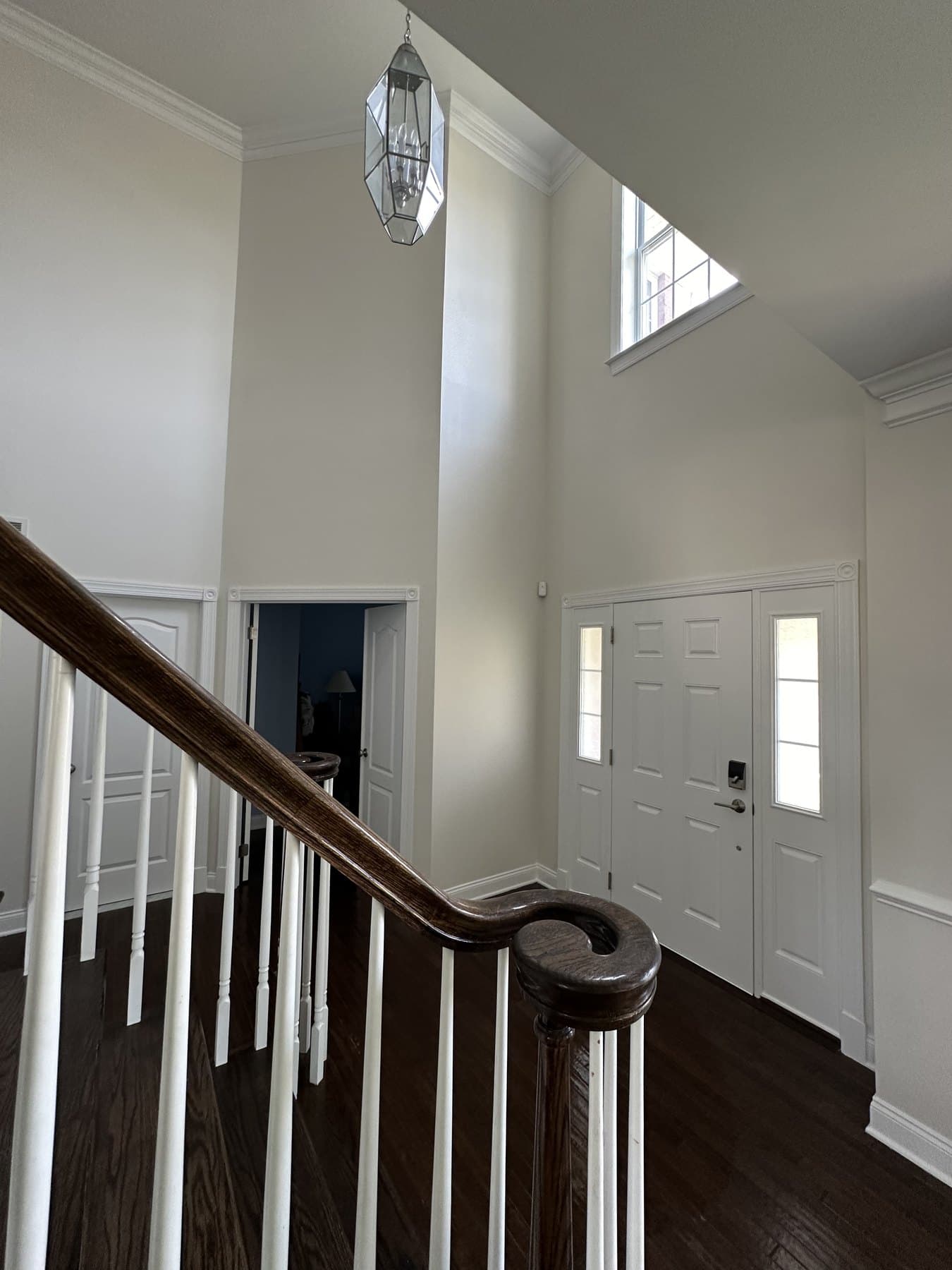 Stair railing detail after interior painting and trim refresh in Macungie