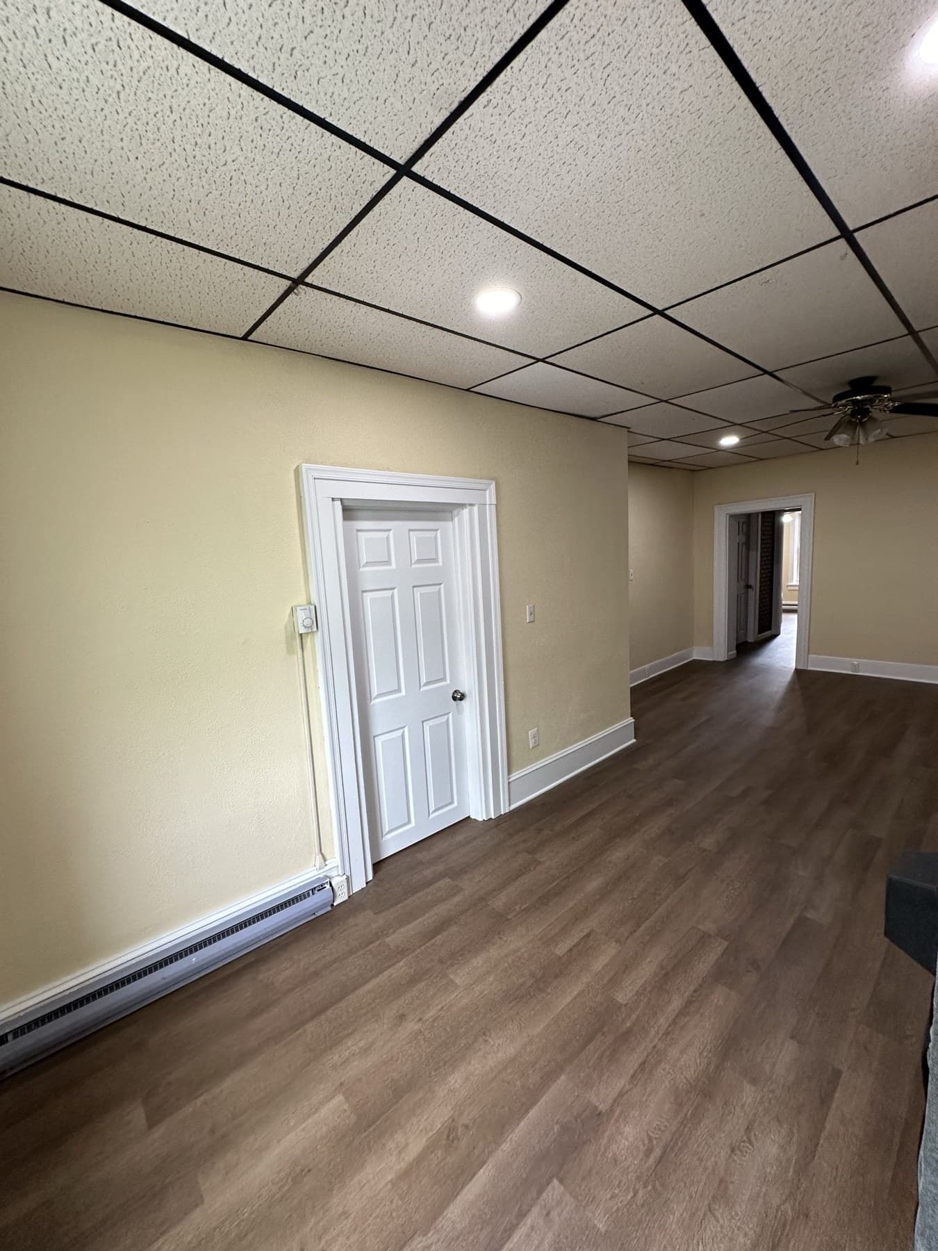 Finished second floor room after flooring painting and ceiling updates in Slatington PA