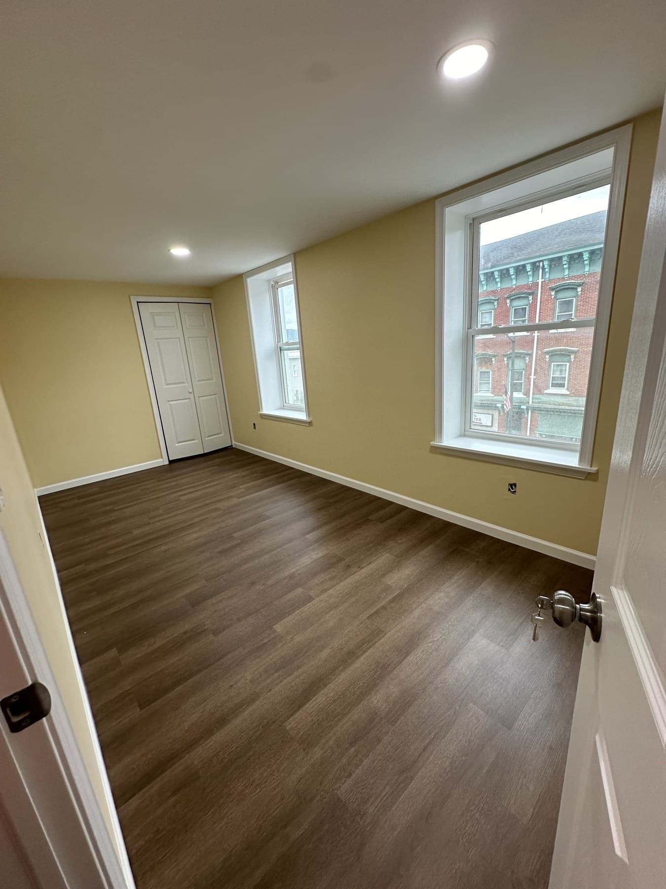 Finished front room with new paint and flooring in a Slatington house
