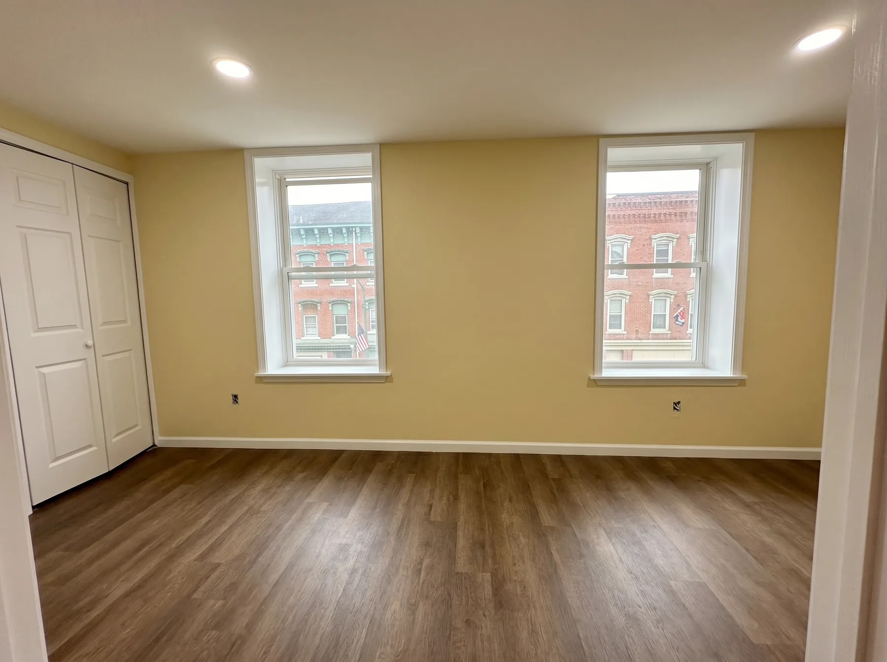 Finished front room with new paint and flooring in a Slatington house