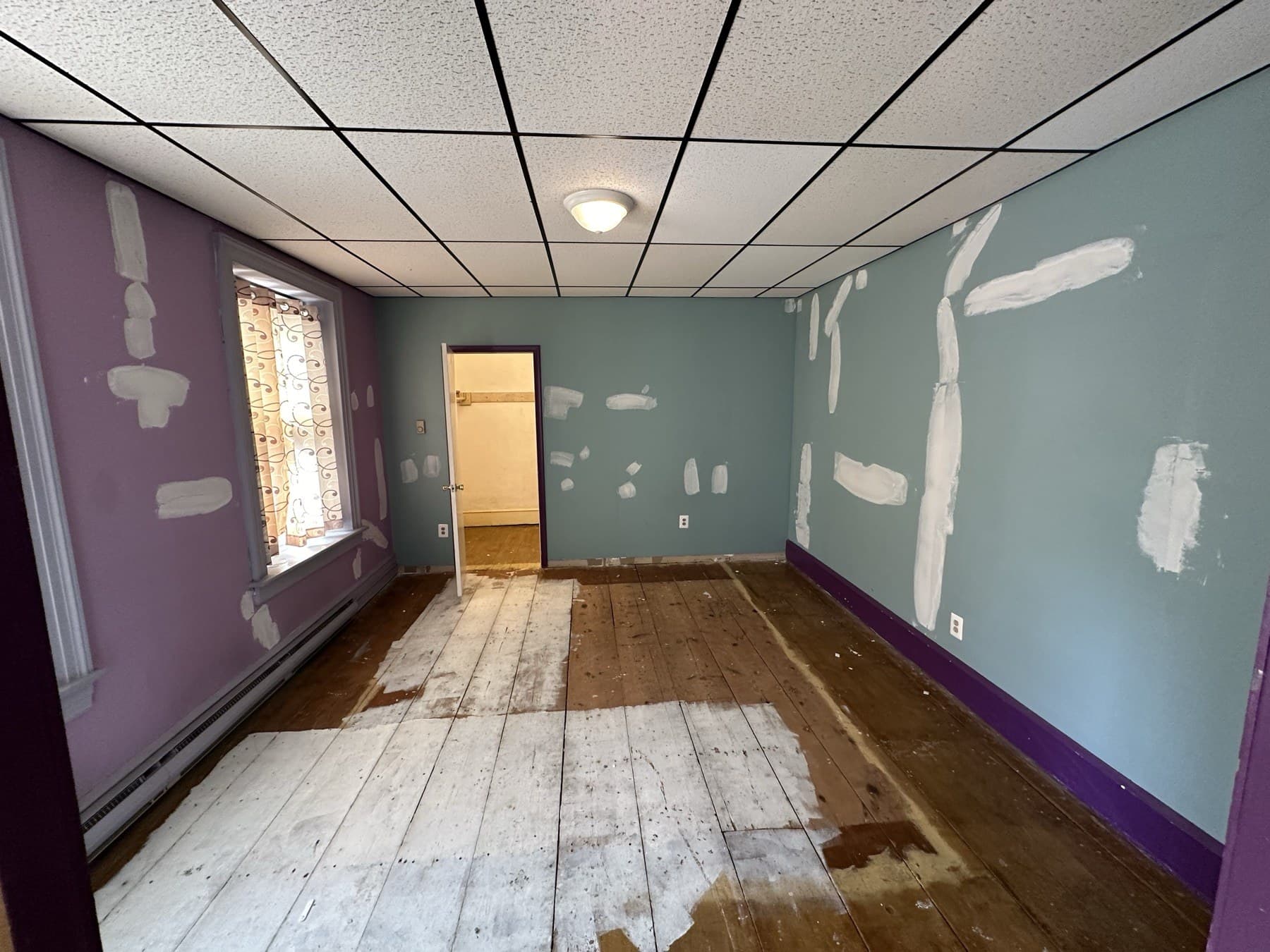 Before photo of second floor room before paint and flooring work in Slatington PA