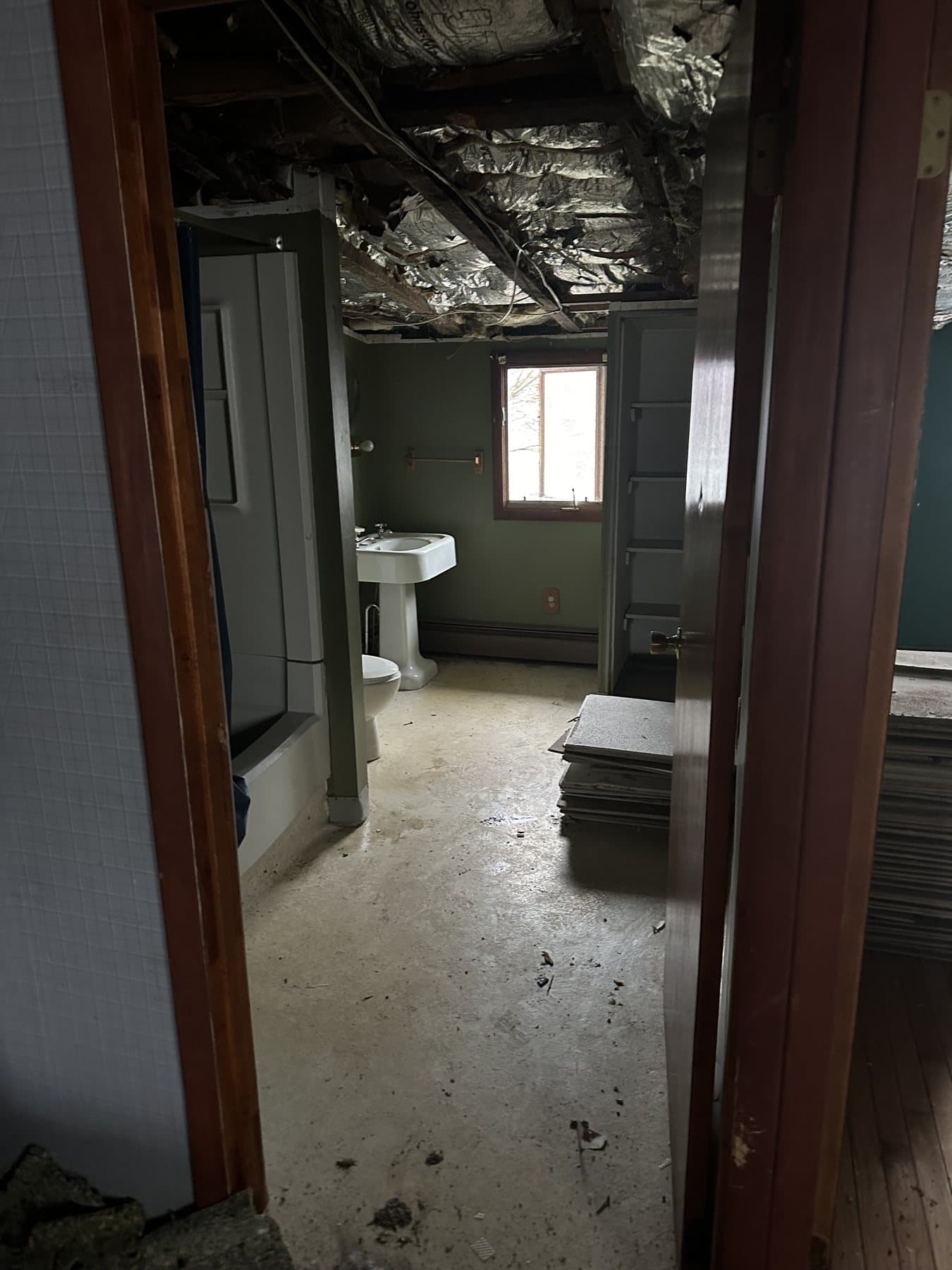 Before photo of bathroom and hall area before renovation in Bethlehem