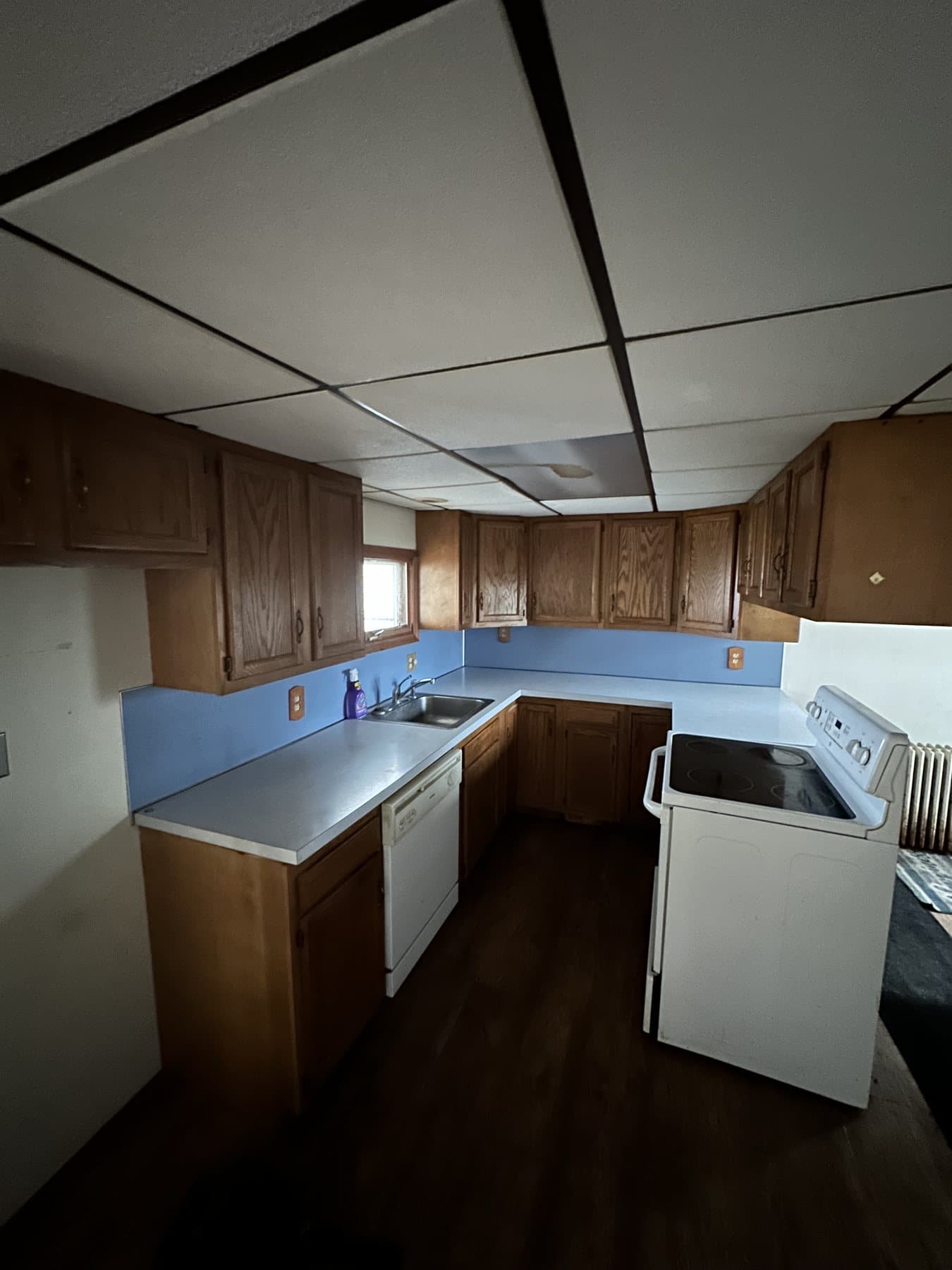 Before photo of dated kitchen with wood cabinets in Westgate Hills Bethlehem