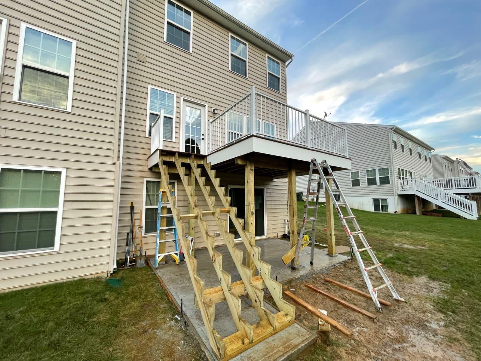 Treated wood deck framing and stair construction during a Macungie deck build