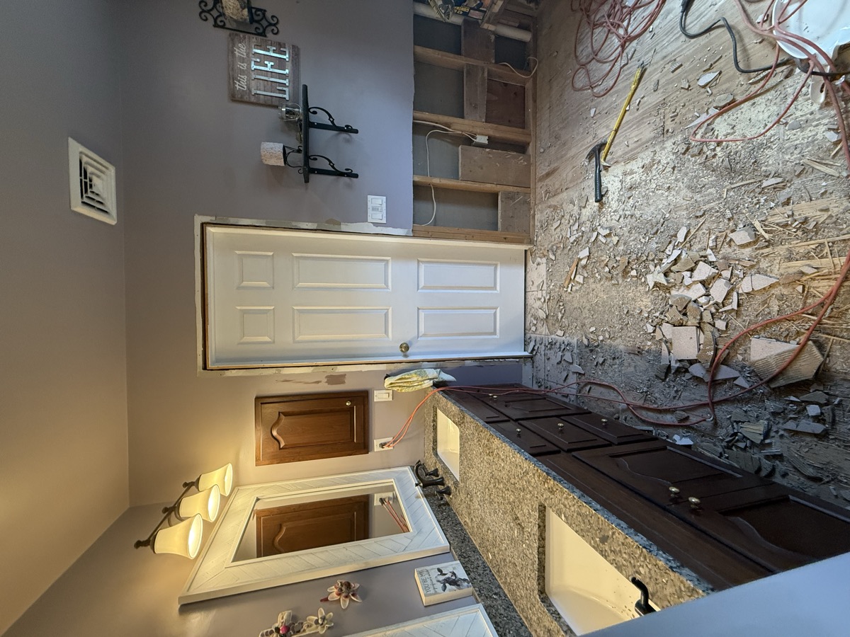 Bathroom vanity wall with stone-look finishes