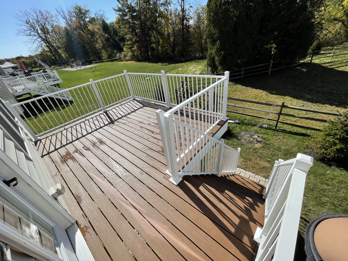 Completed deck surface and railing viewed from above