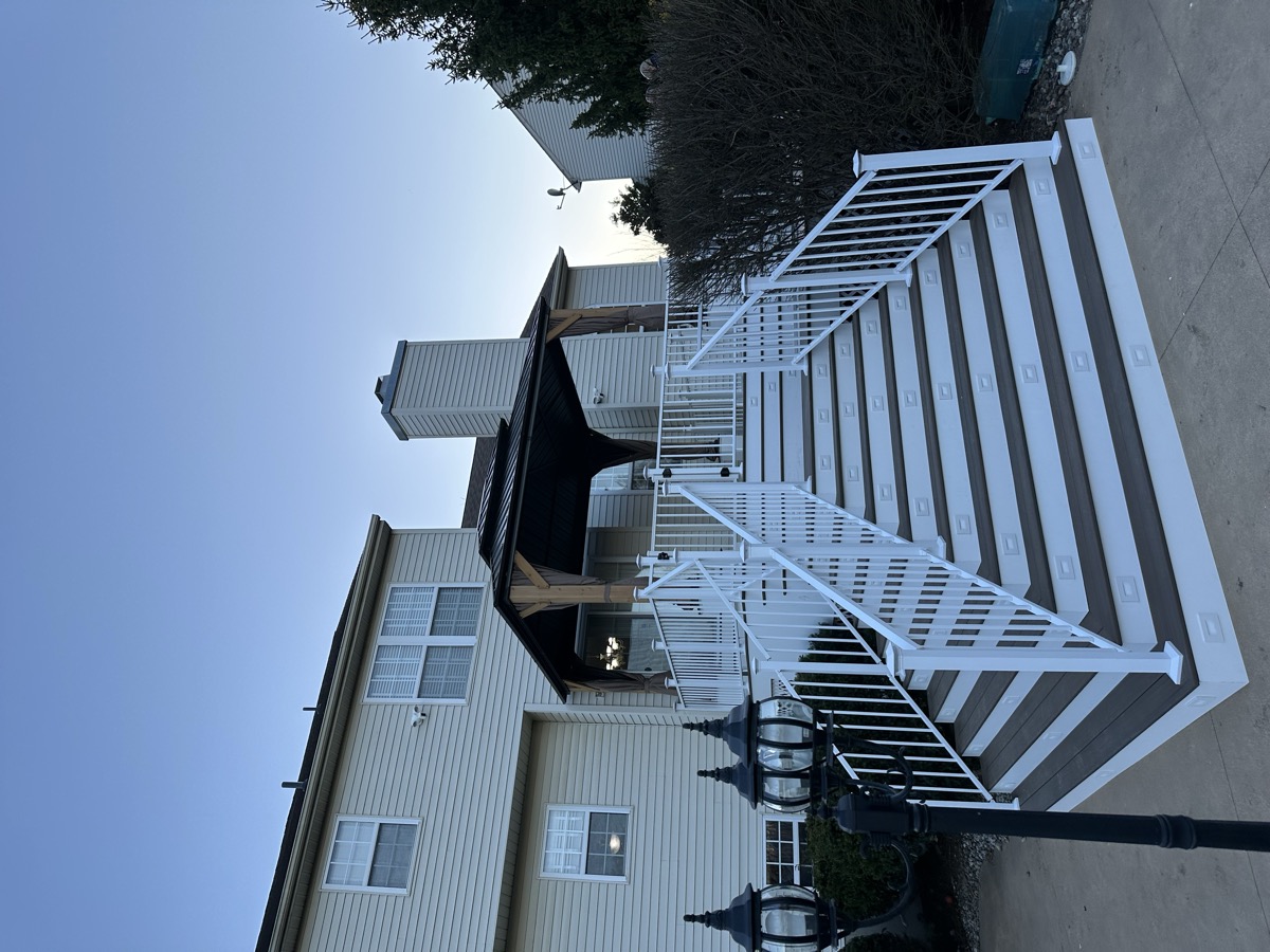 Upper deck and stairs with white railing