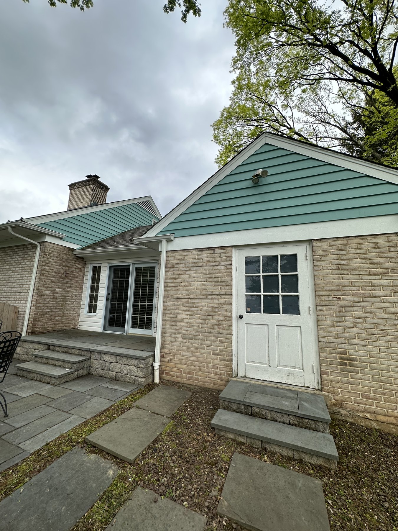 Finished front entry patio area after exterior house painting in South Whitehall Township
