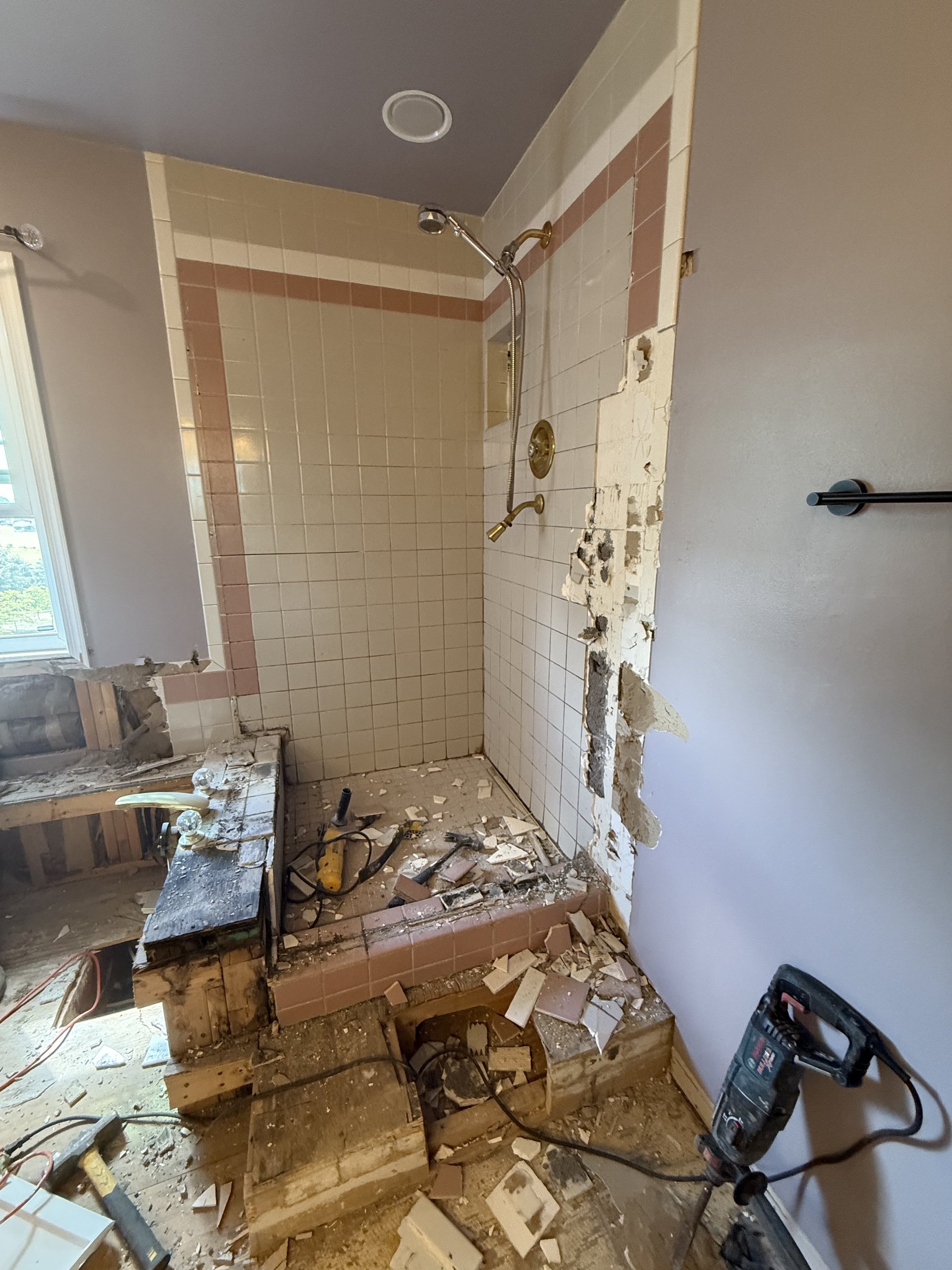 Before photo of older tub and shower tile during bathroom demolition in West End Allentown